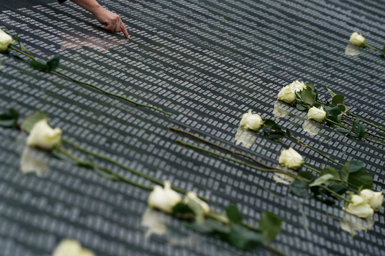 People visit the Korean War Veterans Memorial in Washington, U.S., July 26, 2022. REUTERS/Elizabeth Frantz