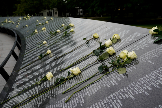 People visit the Korean War Veterans Memorial in Washington, U.S., July 26, 2022. REUTERS/Elizabeth Frantz