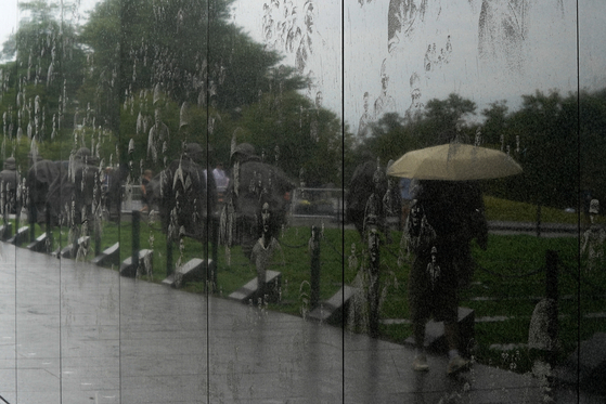 People visit the Korean War Veterans Memorial in Washington, U.S., July 26, 2022. REUTERS/Elizabeth Frantz
