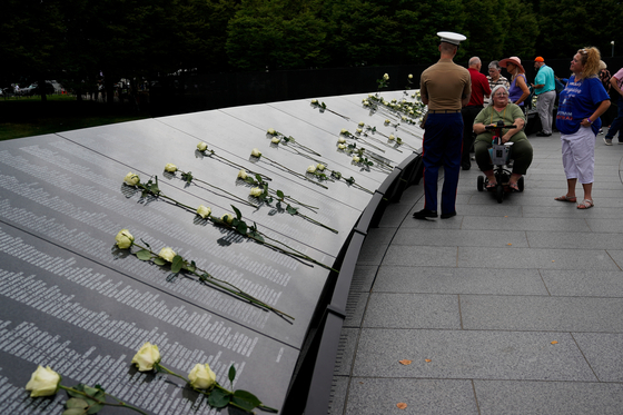 People visit the Korean War Veterans Memorial in Washington, U.S., July 26, 2022. REUTERS/Elizabeth Frantz