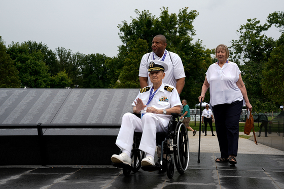 People visit the Korean War Veterans Memorial in Washington, U.S., July 26, 2022. REUTERS/Elizabeth Frantz