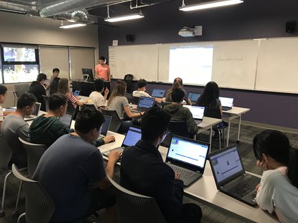 Participants attend an Intro to Coding with Construct 3 workshop.