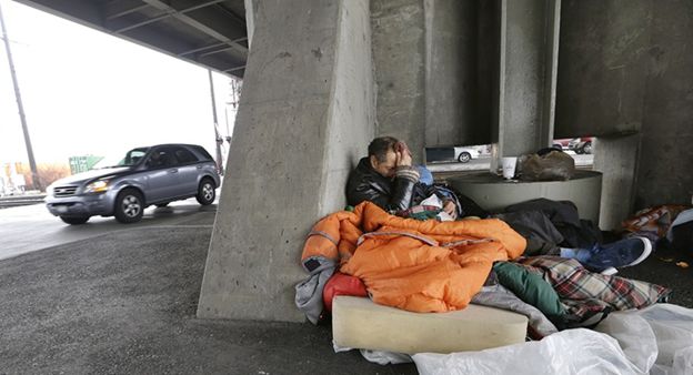 Homeless people can be seen living under bridges or even in sewers impacting their health and even their ability to break out of homelessness.  Source: Associated Press, Elaine Thompson