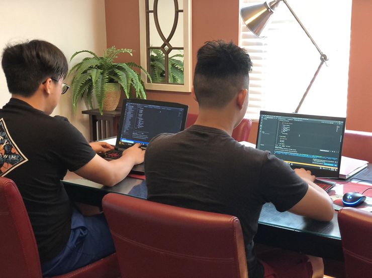 Collaborating to complete a coding problem during BitHacks 2020. [Source: Author, Jonathan Chun]