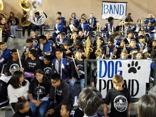 John Muir Middle School Band sat in the stands with Burbank High School marching band before the football game. 