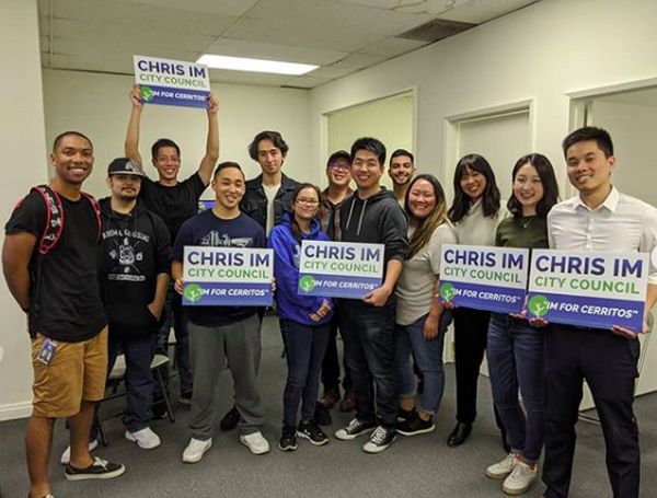 Chris Imm stands with his supporters at his Smash tournament