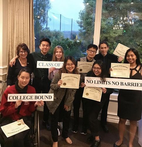 College Match Class of 2023 graduates from Larchmont Charter School are posing at their graduation with our counselor Ellen.(Source: College Match official instagram @cmatchla)