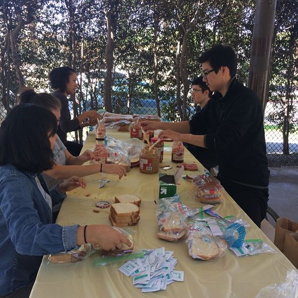 STAND members prepare care packages to distribute during an upcoming excursion to Skid Row.